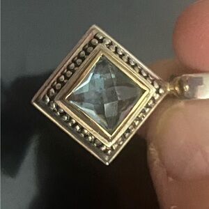 Blue topaz silver and gold pendant